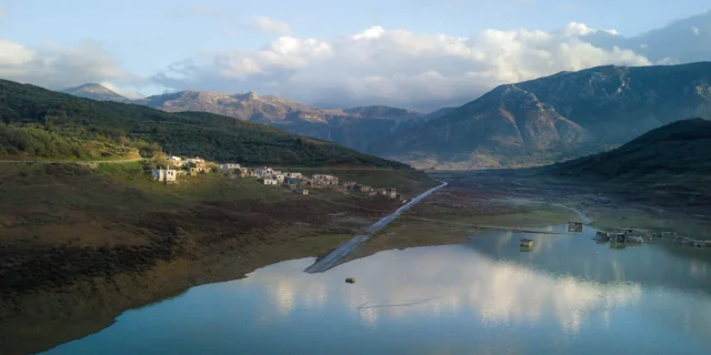 Aposelemis river dam, Sfendyli river, most of the village is visible when the water level is low. The old road to Heraklion is also visible