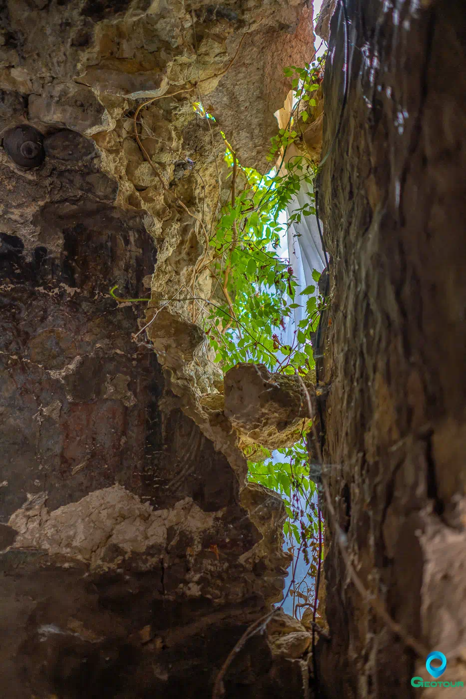 The damaged wall in church of Zoodochos Pigi (Life-Giving Spring) near the village of Archontiko The damaged wall in church of Zoodochos Pigi (Life-Giving Spring) near the village of Archontiko